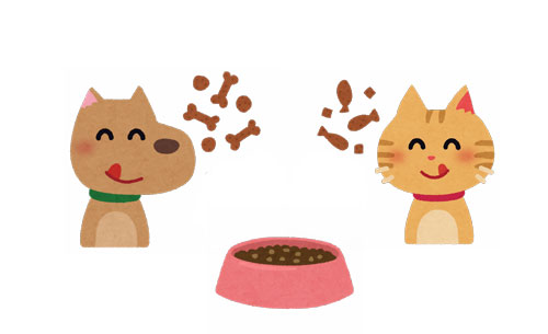 犬と猫の間に置かれた器にペットフードが入っているイラスト