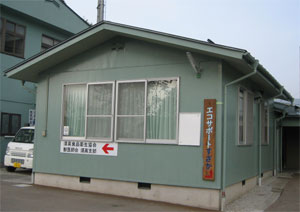 モスグリーン色の平屋づくりのエコサポートすざかの写真