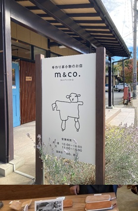 牛の絵が描かれた手作り革小物のお店m&co.の看板の写真